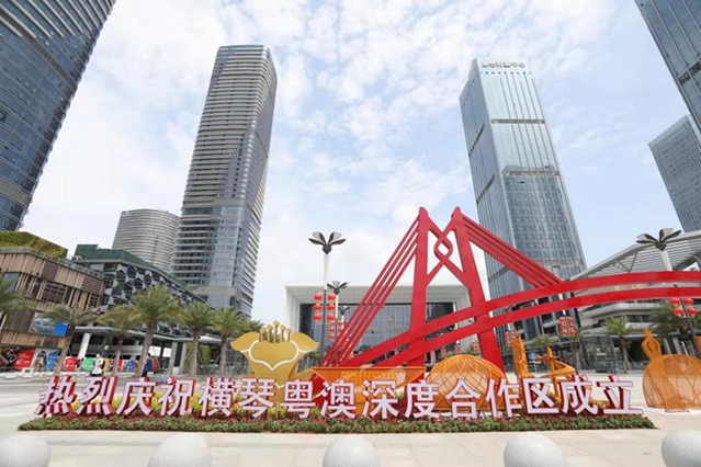 Guangdong-Macao leaders at the reins of brisk Hengqin