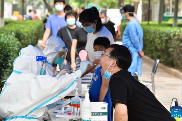 Beijing continues to find scattered infections