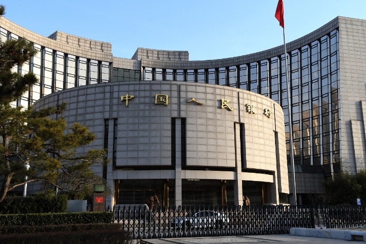 China's central bank cuts policy interest rates to bolster real economy