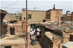Media tour brings shantytown renovation back into the limelight