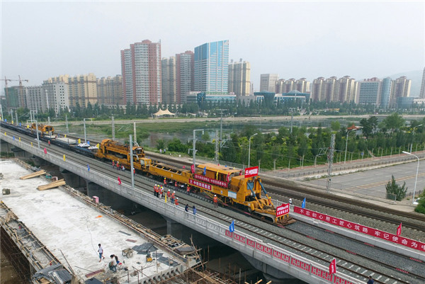 Workers at the construction site of the high-speed railway in Zhangjiakou, Hebei province.jpg