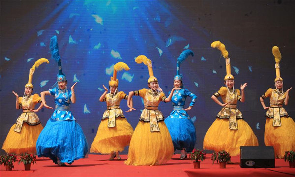 Performers dance during the opening ceremony of Yuquan Folk Festival in Hohhot.jpg