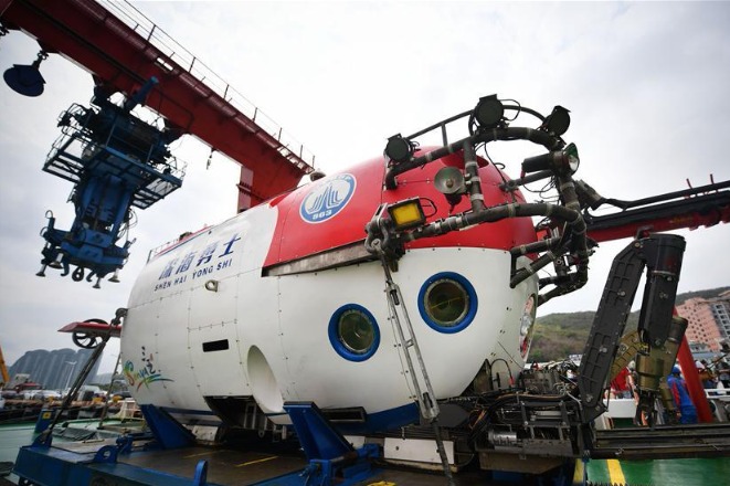 China's new manned submersible completes expedition mission
