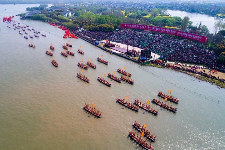 People celebrate centuries-old Qintong Boat Festival