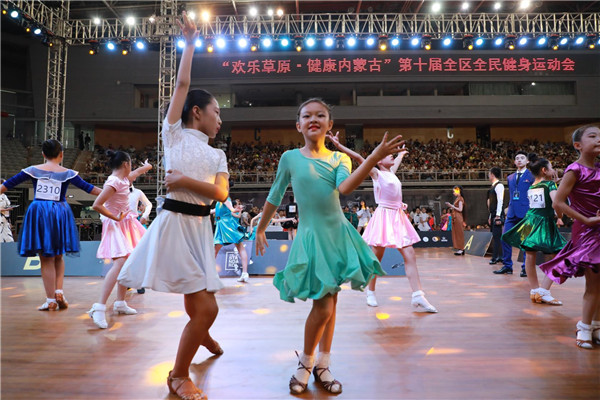Dancers prepare for the WDC China International Ballroom Dance Championships.jpg