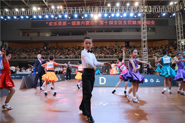 Dancers prepare for the WDC China International Ballroom Dance Championships in Hohhot, Inner Mongolia autonomous region, July 28.jpg