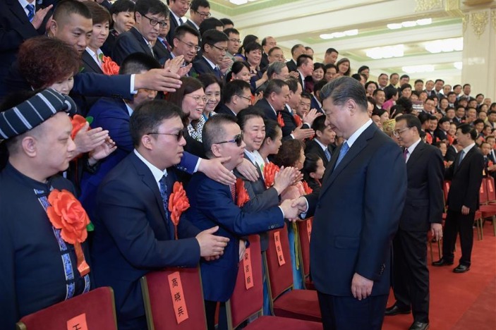 Xi meets role models with disabilities, their outstanding supporters