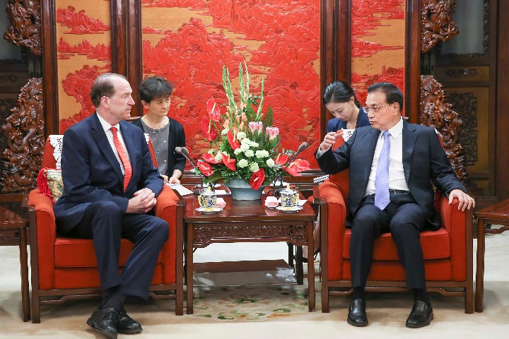 Li pledges to improve business climate