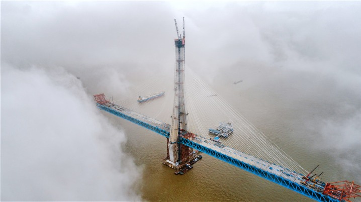 Main tower of world's largest road-rail cable-stayed bridge built