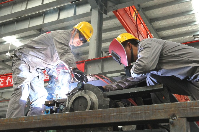 Manufacturing contracts slightly