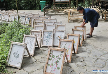 Traditional paper making in combination with cultural innovation in village of Guizhou