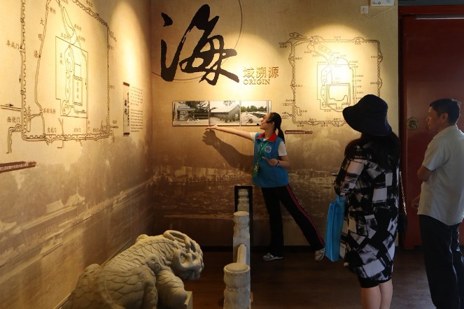 Beijing revives traditional art through historic block protection