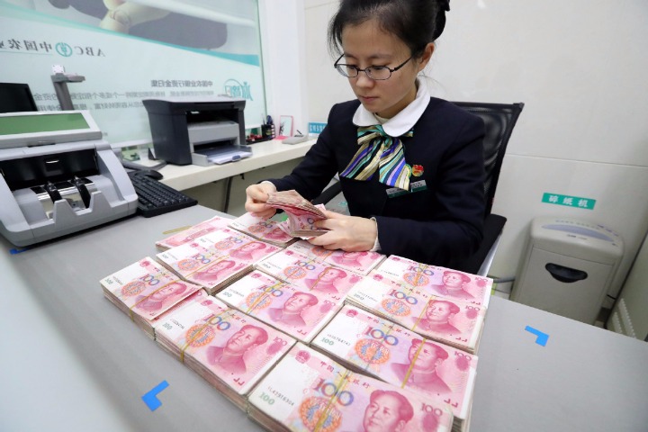 Former central bank official says keeping yuan stable 'crucial'