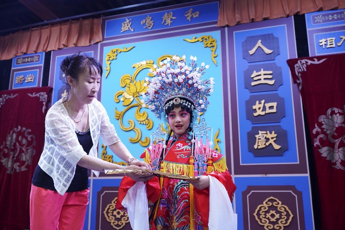 Children learn Peking Opera in Qinhuangdao, China's Hebei