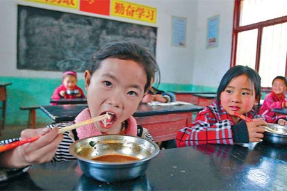 New school kitchen helps principal serve meals, knowledge