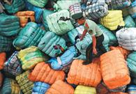 China tightens ban on solid waste imports