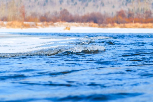 Frozen river heralds early winter