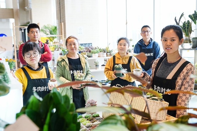 Hearing impaired develop careers at Tianjin plant store
