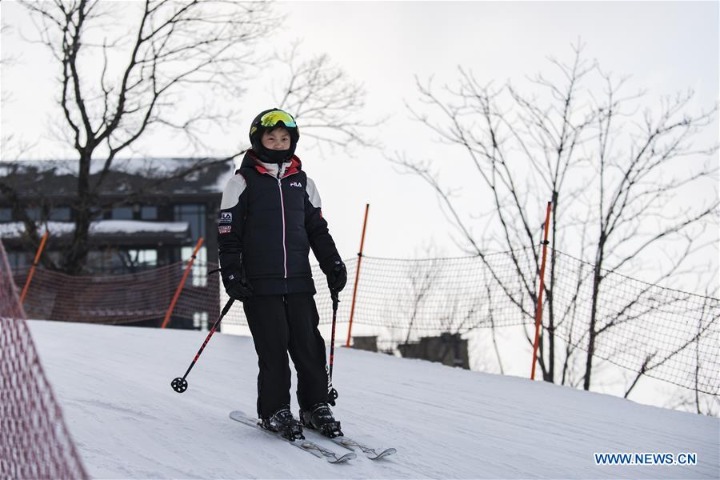 Enthusiasts skiing at Lake Songhua Resort in Jilin
