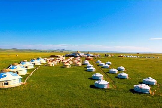 Tourist train across grasslands, mountains launched in N China