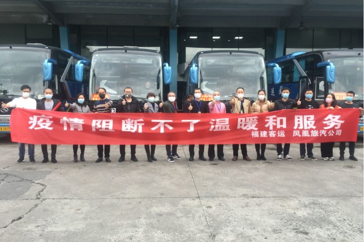 Buses bring first group of workers back to Fuzhou