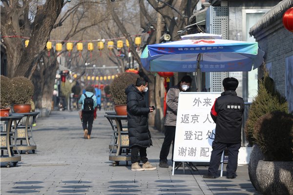 Beijing imposes new quarantine rule for returnees