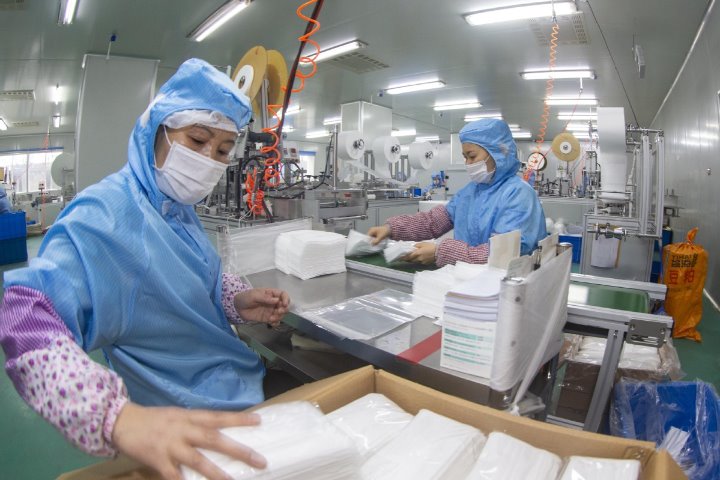 In one week, Beijing sets up factory that can make 10 million masks a month