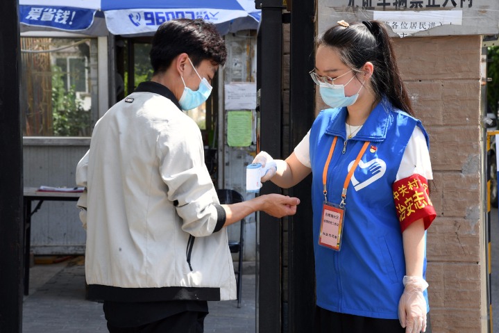 COVID restrictions lowered in Beijing