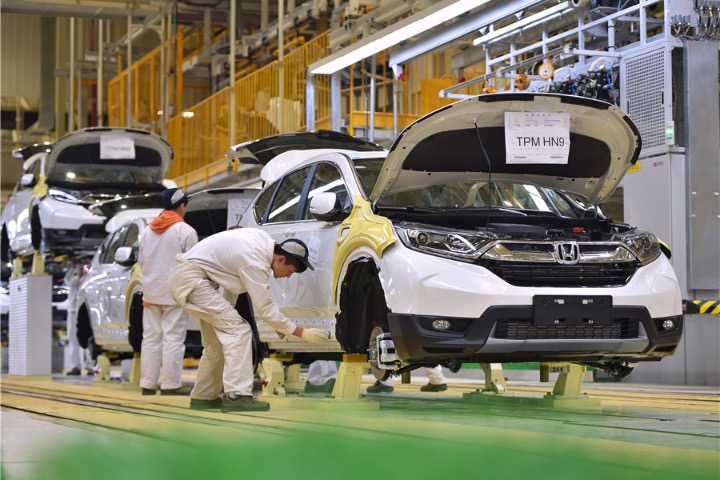 General Motors, Honda sign deal to share development tech costs