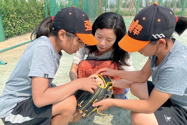 Leaving the mountain - baseball coach helps Yi girls form team