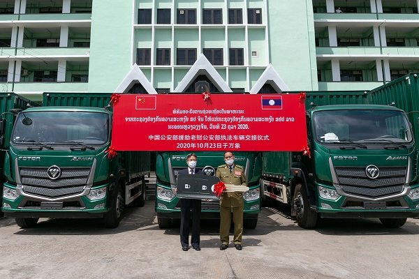 China hands over law enforcement vehicles in assistance to Laos
