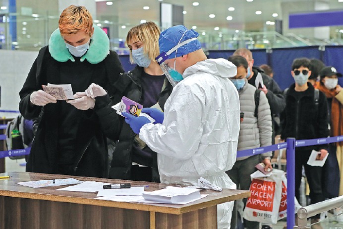 China bars arrivals from 4 countries due to virus