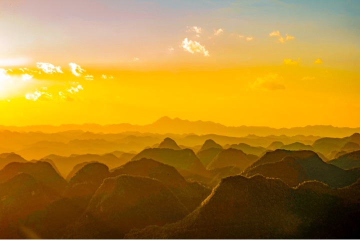 Stunning sunset blankets Yunnan mountains in gold