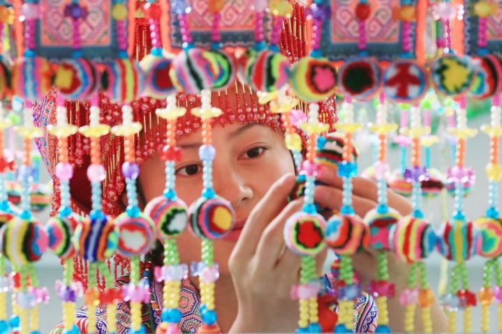 Colorful attire creates wealth in Guizhou