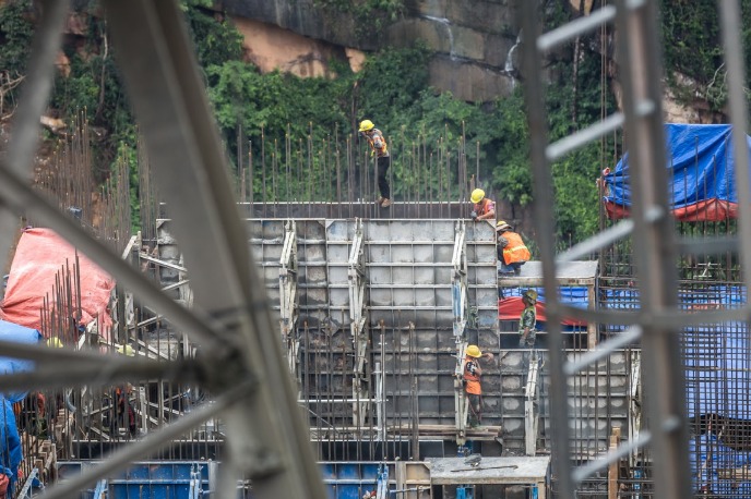 China tightens management of central SOEs' overseas assets