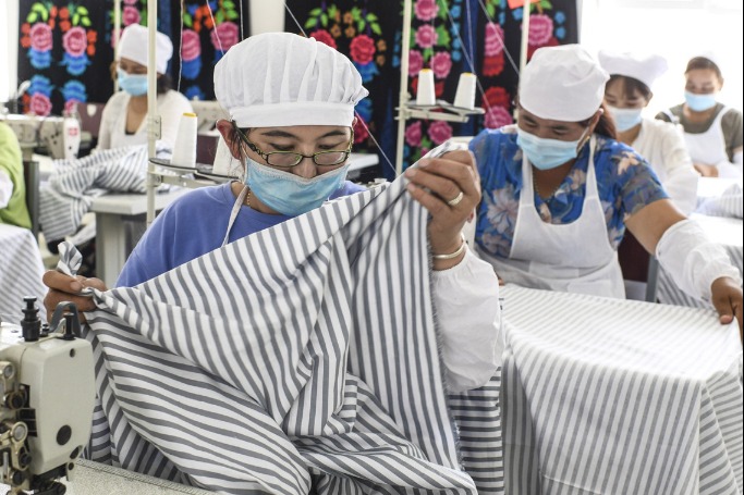 Employment transforms Xinjiang locals' lives