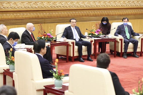 Premier Li meets with foreign experts as Spring Festival nears