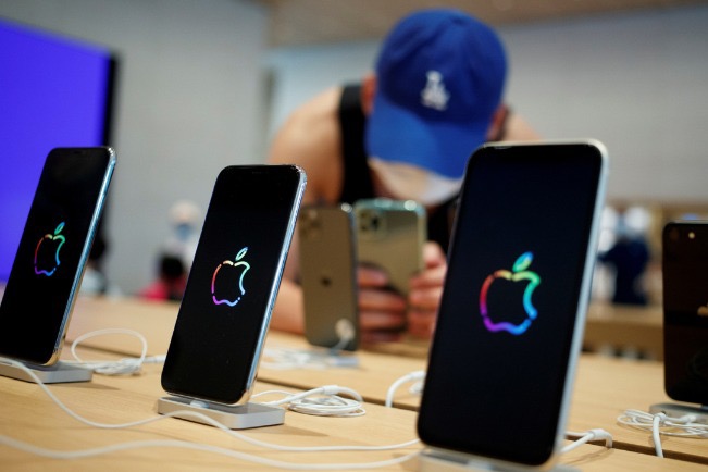 Apple posts record revenue with boost from 5G iPhones
