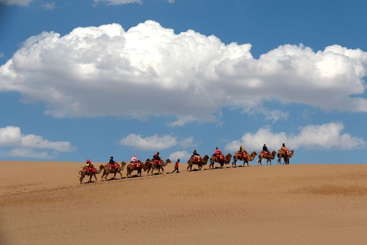 Desert landscapes shine with sunny weather in Gansu