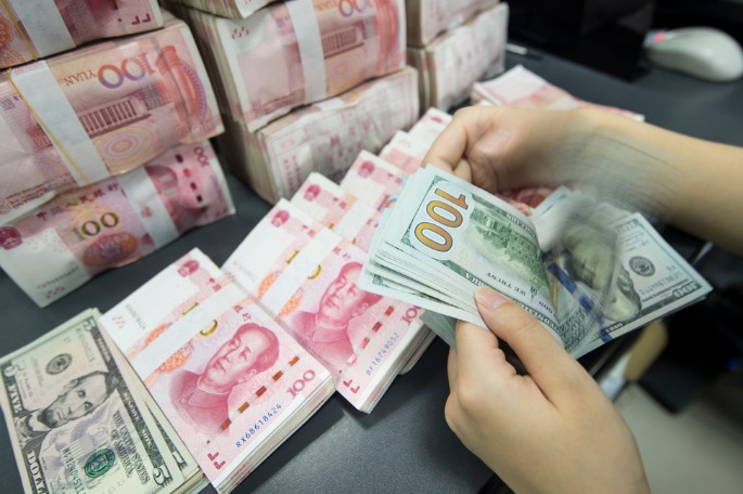 RMB climbs to three-year high against dollar