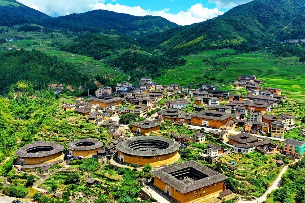 Terraced fields and featured dwellings form delightful contrast