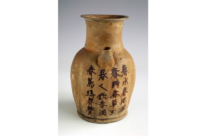 Brown glazed ceramic ewer with poem inscriptions, Changsha ware