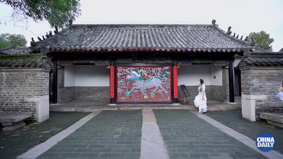 Expats tour Confucius-related spots in Qufu