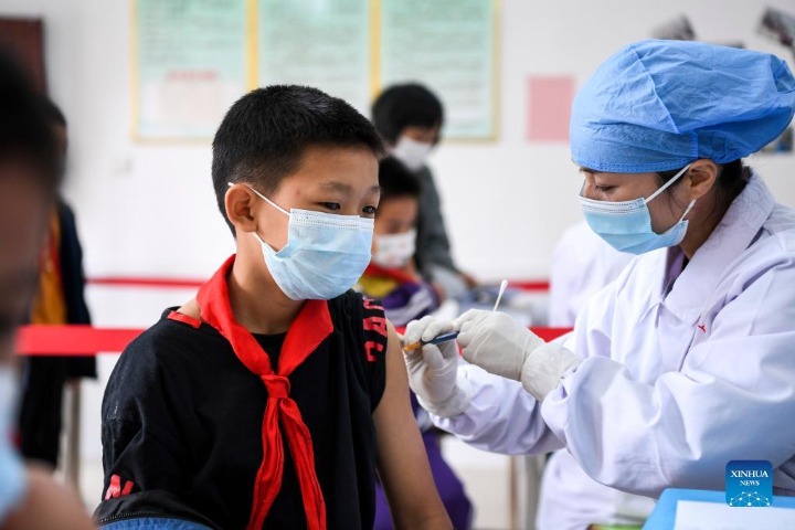 Total of 1.225 bln people in China vaccinated against COVID-19