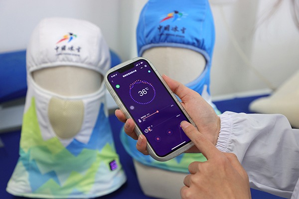 High-tech gloves, masks to warm Olympic athletes