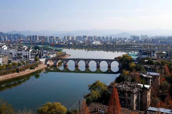 Flood-destroyed ancient bridge to reopen in E China