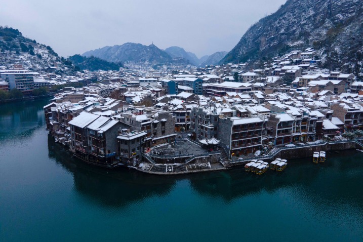 Ancient town in Guizhou coated in snow