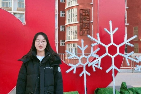 Shen Ao is one of 27,000 volunteers to Beijing 2022