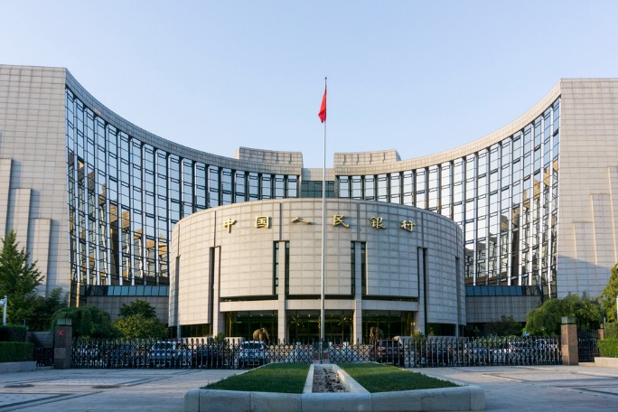 China's central bank cuts rates on medium-term loans, reverse repos