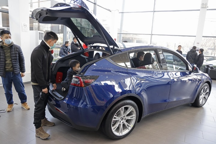 Tesla says EVs are more profitable